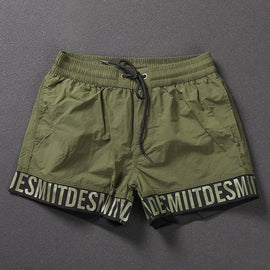 Buy green Beach Shorts Summer Mens Sports Swim Trunks Gym Training Shorts Quick-Drying Lightweight Letters Edge Trendy 2024 Shorts New